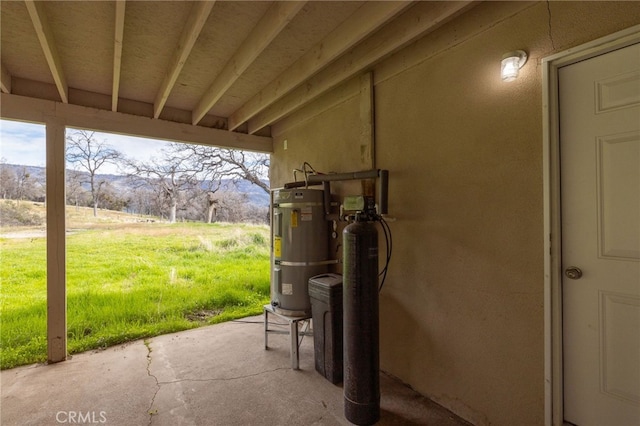 view of patio featuring secured water heater