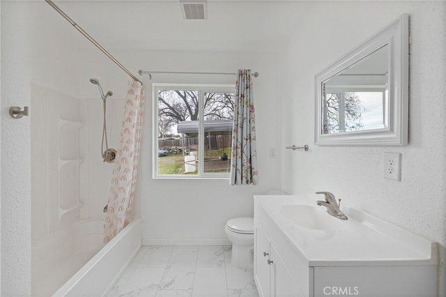 full bathroom with visible vents, toilet, shower / tub combo with curtain, marble finish floor, and vanity