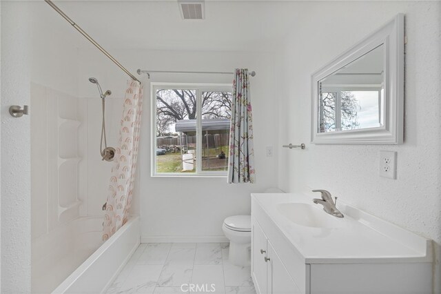 bathroom with marble finish floor, visible vents, toilet, vanity, and shower / bath combo with shower curtain