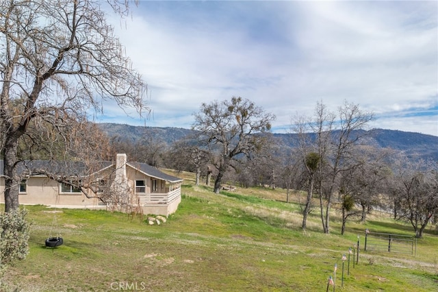 view of mountain feature featuring a rural view