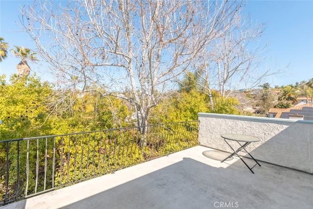 view of patio / terrace with a balcony