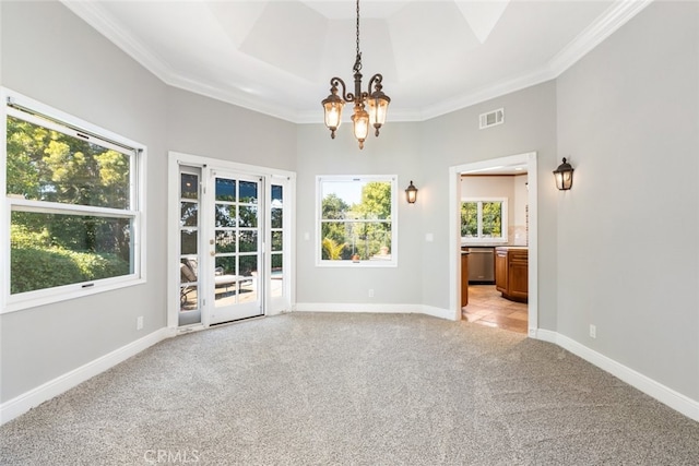 empty room featuring ornamental molding, visible vents, light carpet, and baseboards