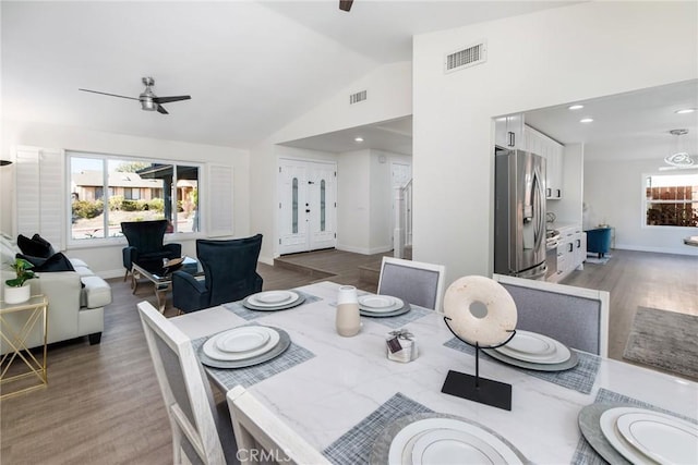 dining area featuring a wealth of natural light, visible vents, and ceiling fan