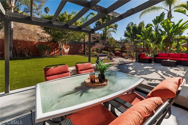 view of patio featuring outdoor dining space, a pergola, a fenced backyard, and an outdoor hangout area