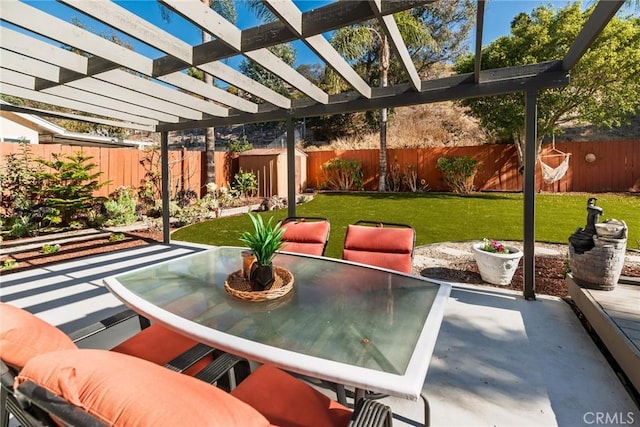 view of patio with outdoor dining area, a fenced backyard, and a pergola