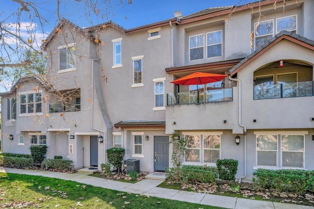 multi unit property with central AC and stucco siding