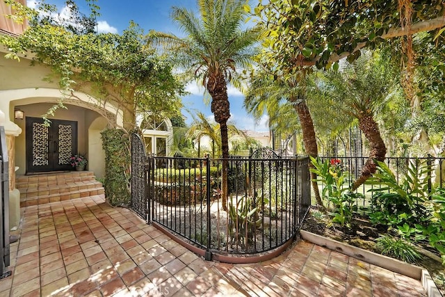 view of gate featuring fence