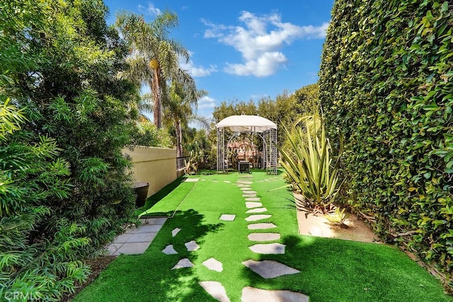 view of yard featuring fence