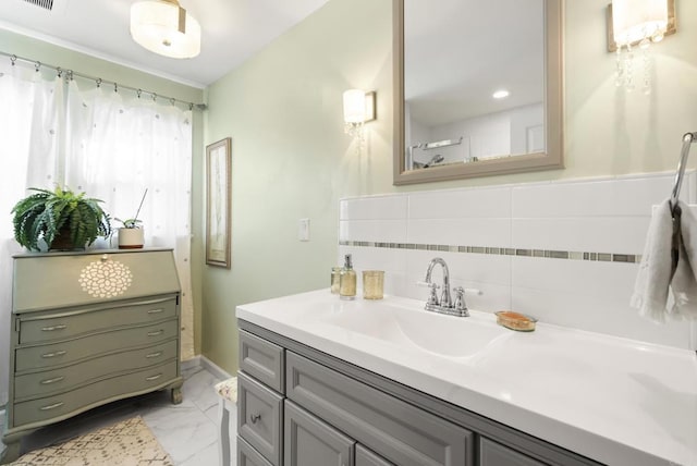 full bathroom with marble finish floor and vanity