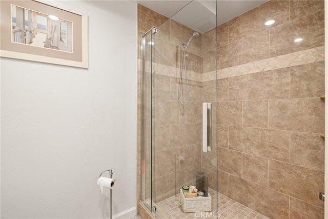 full bathroom with a stall shower