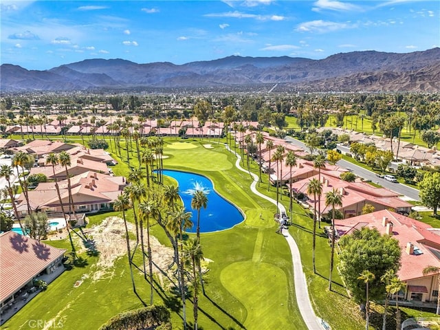 bird's eye view featuring a residential view, golf course view, and a water and mountain view