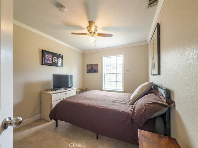 tiled bedroom featuring baseboards, a ceiling fan, visible vents, and crown molding