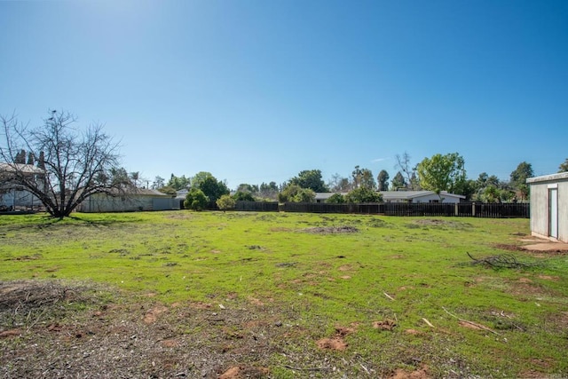 view of yard with fence