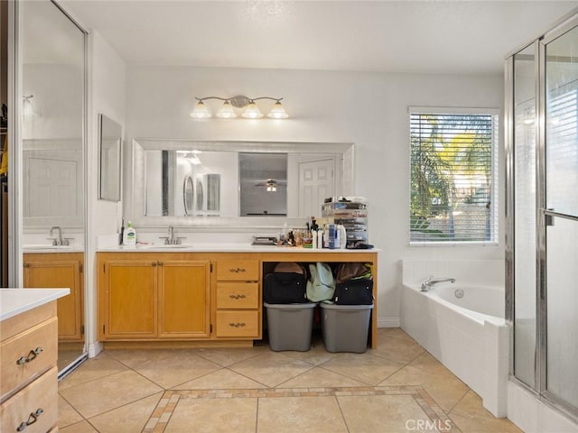 full bath featuring tile patterned flooring, vanity, a shower stall, and a bath