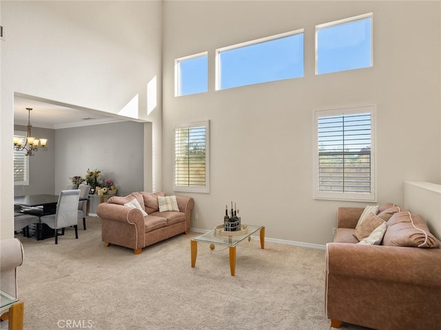 30514 Sorrento Pl, Castaic, CA 91384 - living room featuring carpet flooring, a chandelier, a towering ceiling, and crown molding