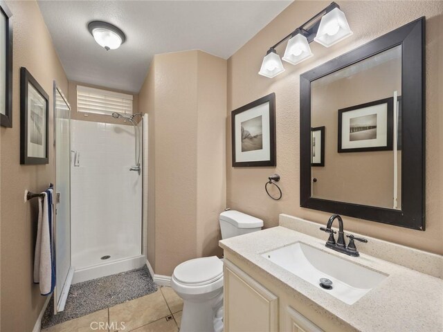 30514 Sorrento Pl, Castaic, CA 91384 - full bathroom with tiled shower, vanity, and tile patterned floors