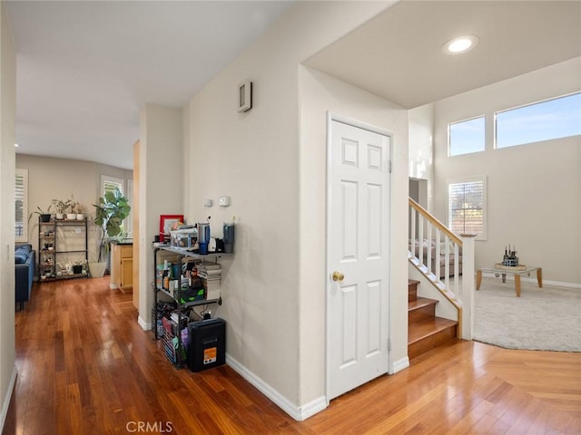30514 Sorrento Pl, Castaic, CA 91384 - corridor with stairway, wood finished floors, and recessed lighting