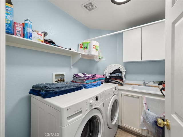 30514 Sorrento Pl, Castaic, CA 91384 - laundry area with washer and clothes dryer and cabinet space