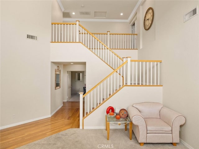 30514 Sorrento Pl, Castaic, CA 91384 - staircase featuring crown molding, recessed lighting, and wood finished floors