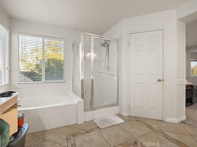 30514 Sorrento Pl, Castaic, CA 91384 - bathroom featuring a stall shower, a bath, and inlaid floor details