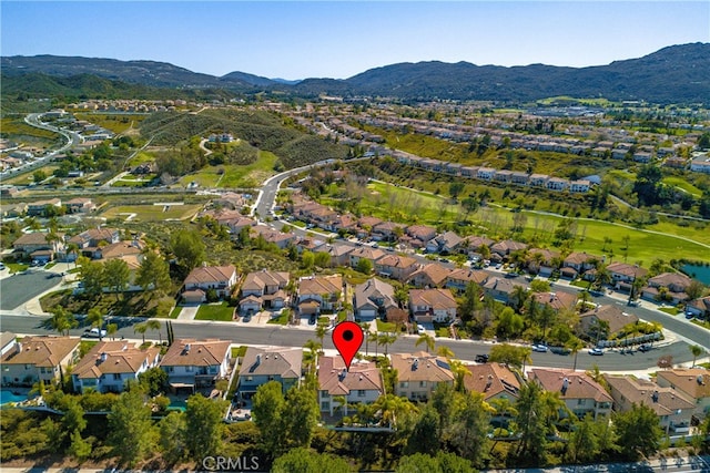 bird's eye view with a residential view and a mountain view