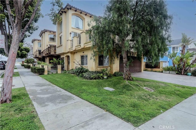 view of property with driveway and fence