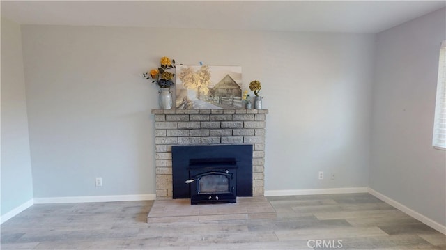 room details featuring baseboards and wood finished floors