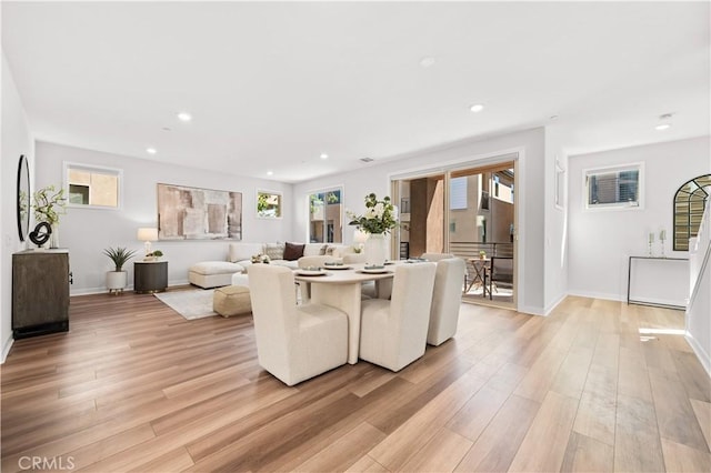 interior space featuring light wood finished floors, baseboards, and recessed lighting