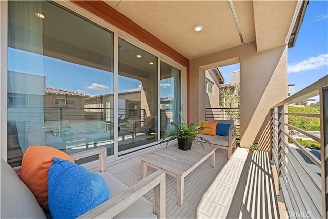 balcony with an outdoor hangout area