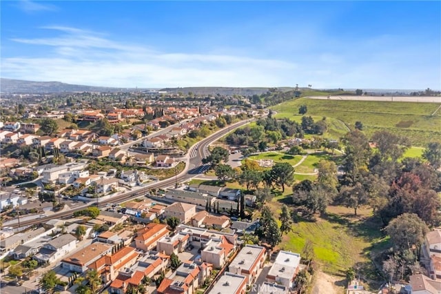 birds eye view of property with a residential view