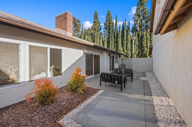 view of patio / terrace with fence