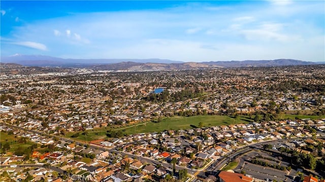 birds eye view of property with a mountain view and a residential view