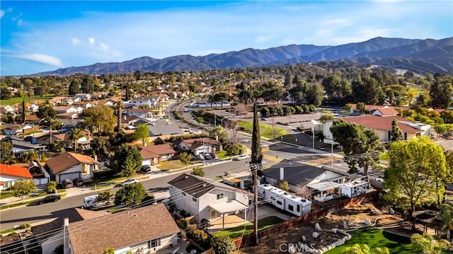 birds eye view of property featuring a residential view and a mountain view