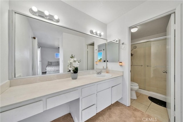 full bath featuring toilet, a stall shower, tile patterned flooring, and vanity