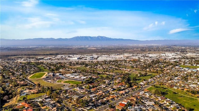 drone / aerial view with a residential view and a mountain view