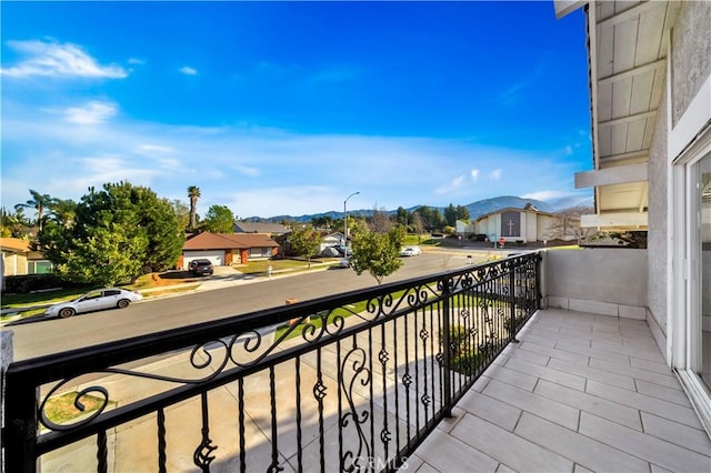 balcony featuring a residential view