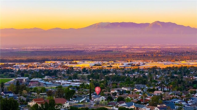 bird's eye view featuring a residential view and a mountain view