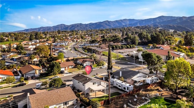 drone / aerial view featuring a mountain view and a residential view