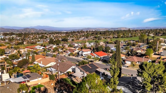 drone / aerial view with a residential view and a mountain view