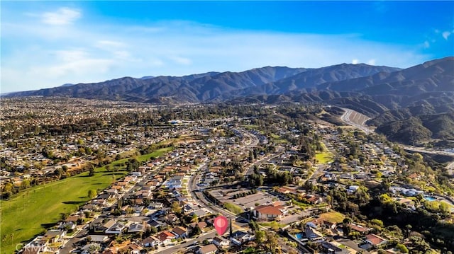 aerial view with a residential view and a mountain view