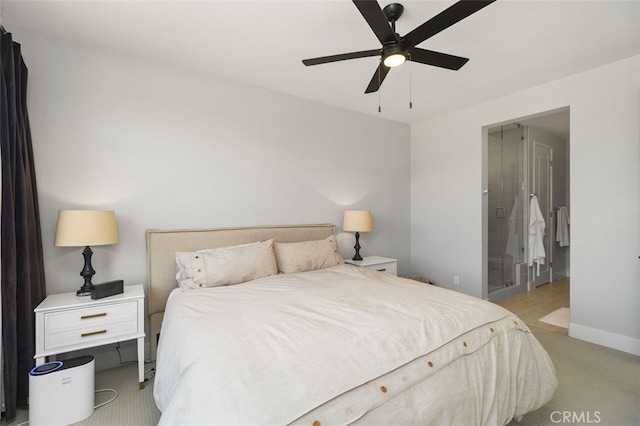 bedroom featuring ceiling fan, baseboards, and light colored carpet