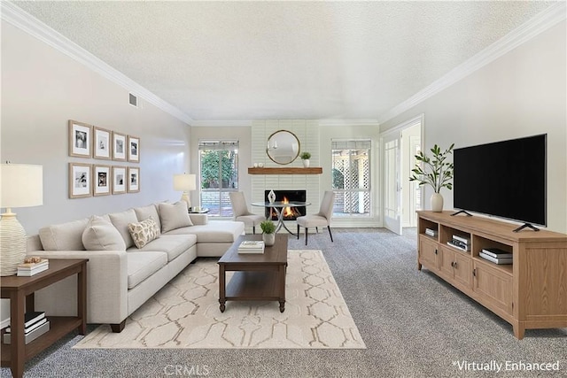 living area featuring light carpet, a brick fireplace, crown molding, and a textured ceiling