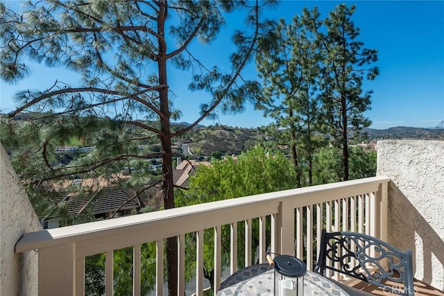 wooden terrace with a mountain view