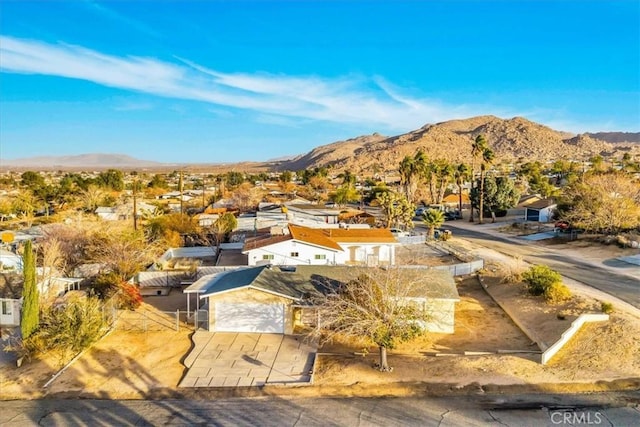 bird's eye view with a residential view and a mountain view