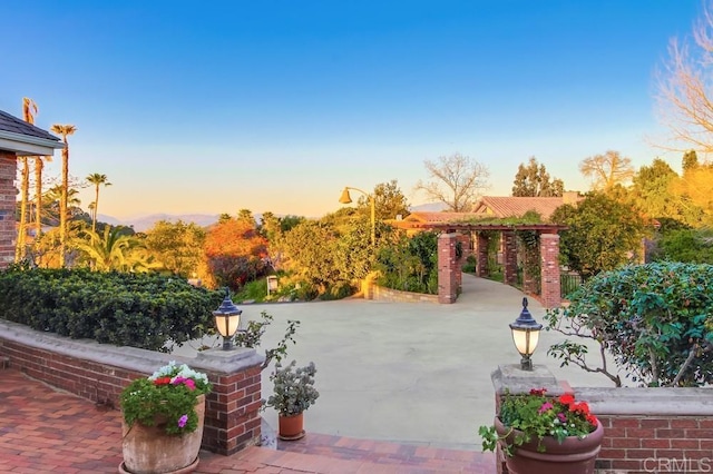 view of property's community featuring a patio area