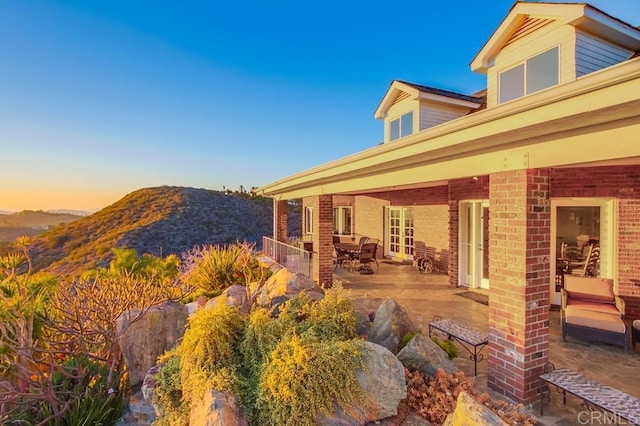 view of patio with a mountain view