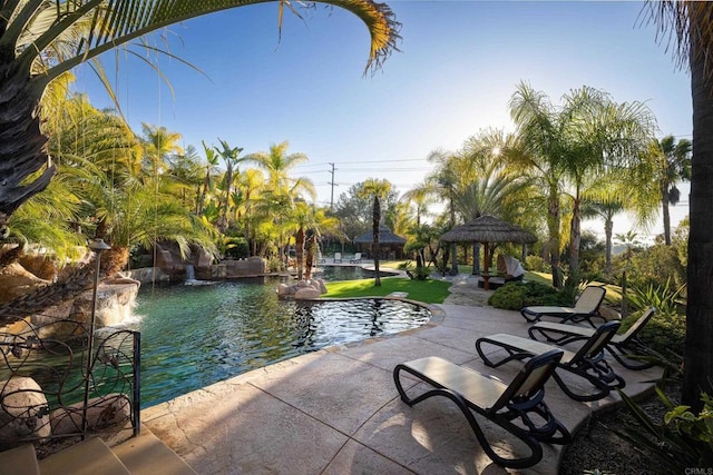 view of pool with a gazebo and a patio