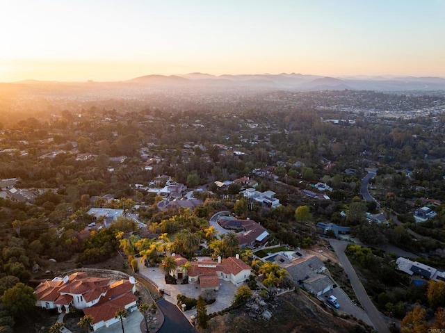 aerial view at dusk with a mountain view