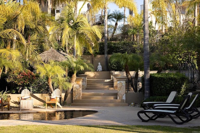 view of community with a patio area