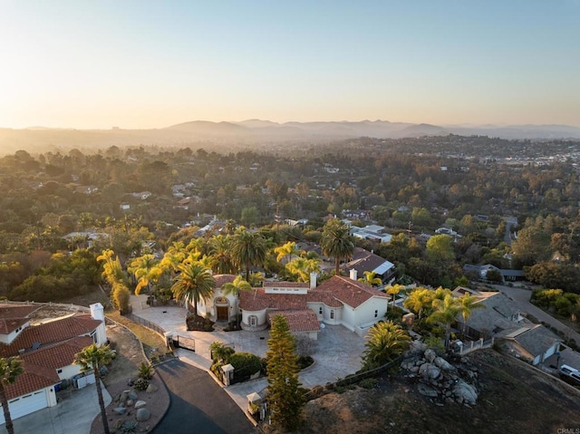 aerial view at dusk with a mountain view